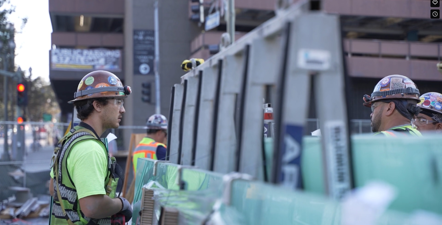 glaziers at building site